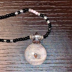 Original handmade necklace featuring opal center